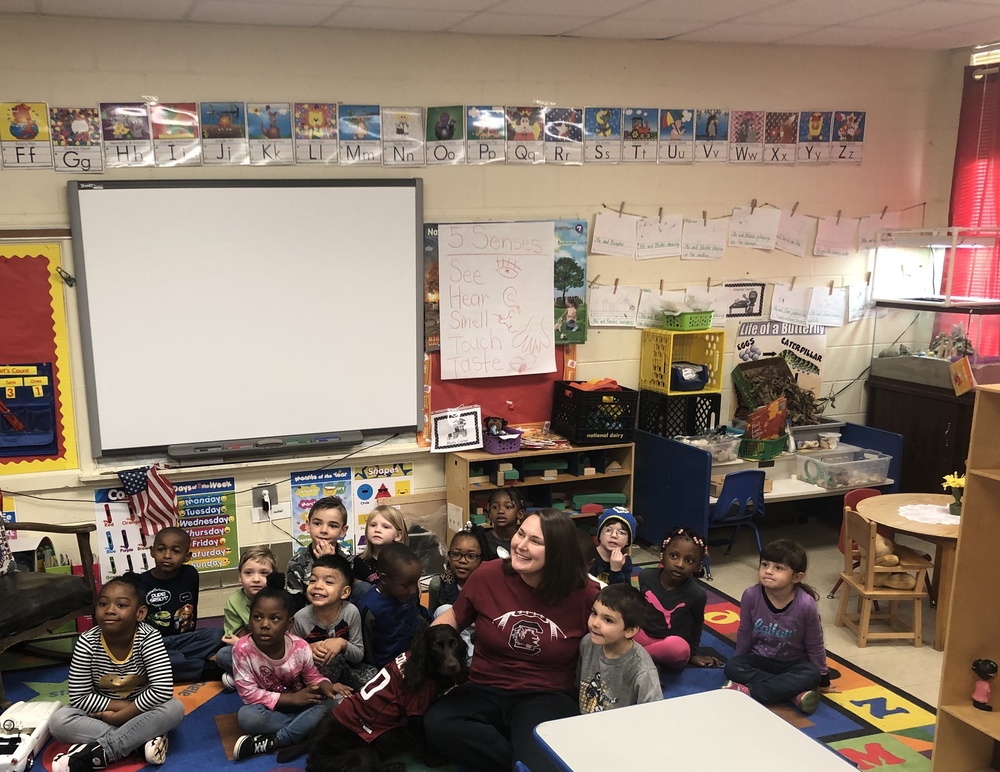 Coach Newton brought her Boykin Spaniel, the SC State Dog, to visit K4 in honor of South Carolina Day.  