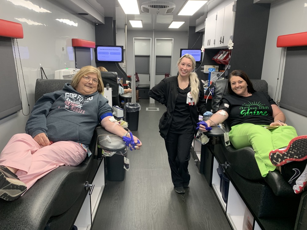 staff giving blood donations