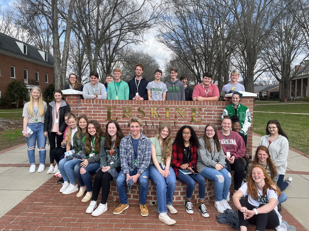 Students in front of Erskine sign
