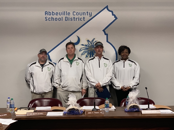 Dixie High football coaches and principal, Lori Brewton