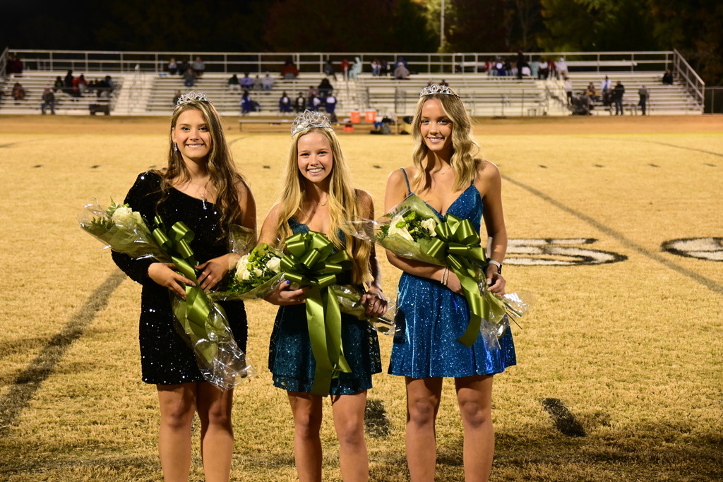 Homecoming Girls with their flowers and crowns. 